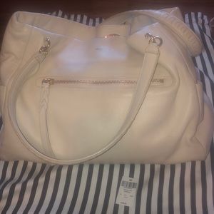 Henri Bendel cream handbag, gently used